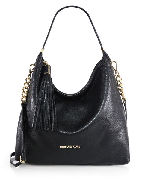 michael kors black shoulder handbags|Michael Kors black signature purse.